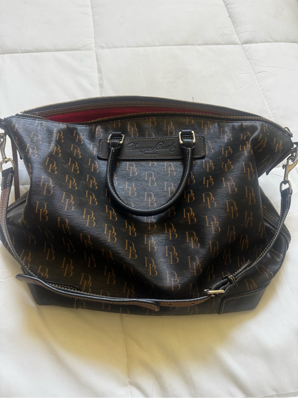 Dooney & Bourke Dark Brown Monogram Duffel with Red Interior